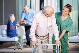 nurse supporting elderly parents